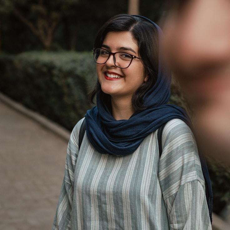 Portrait of Aria Chen, group coordinator and fusion cooking expert